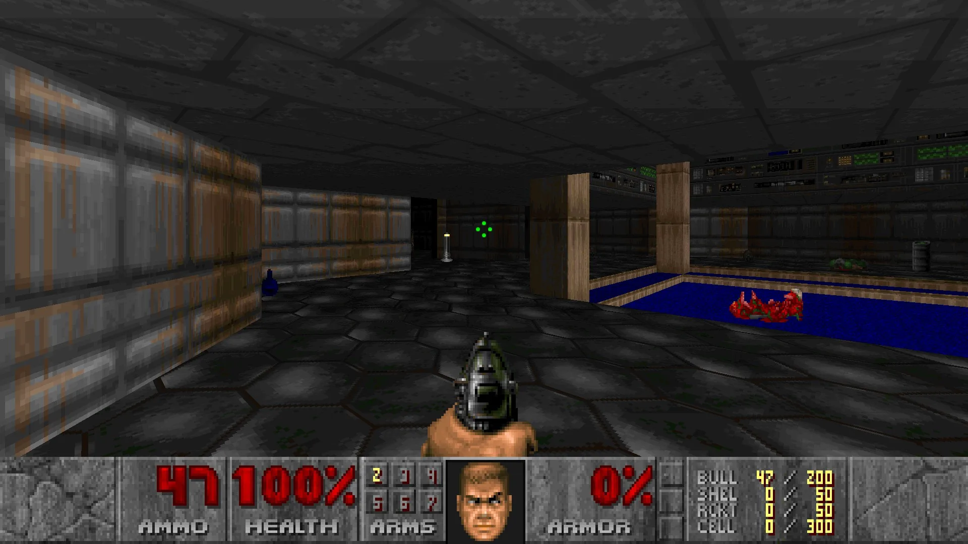 Dolny panel interfejsu w Doomie (id Software, 1993) zawiera podstawowe dane o zdrowiu postaci i posiadanej broni. Grafika prywatna.